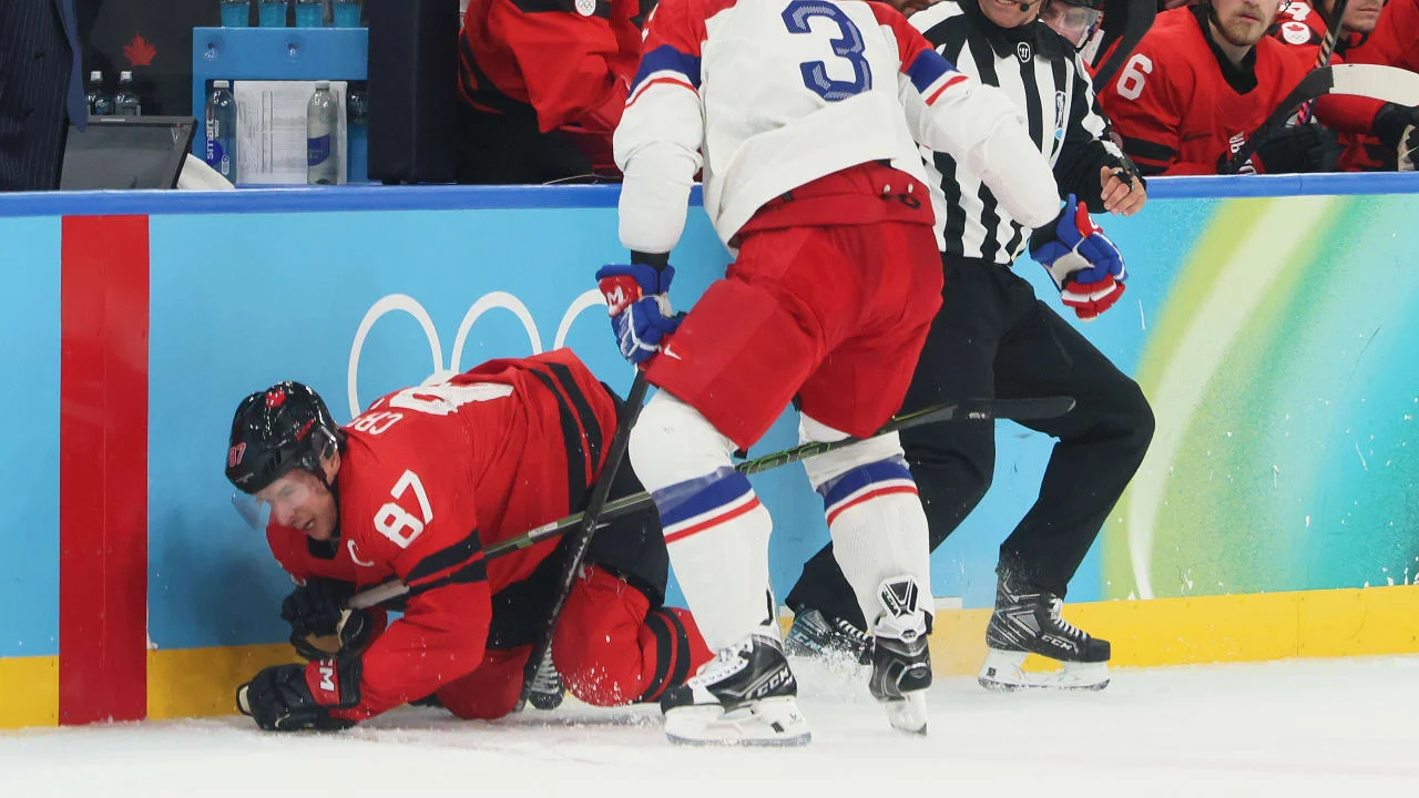 Crosby exits Canada’s Olympic quarterfinal with lower-body injury as Canada advances in OT