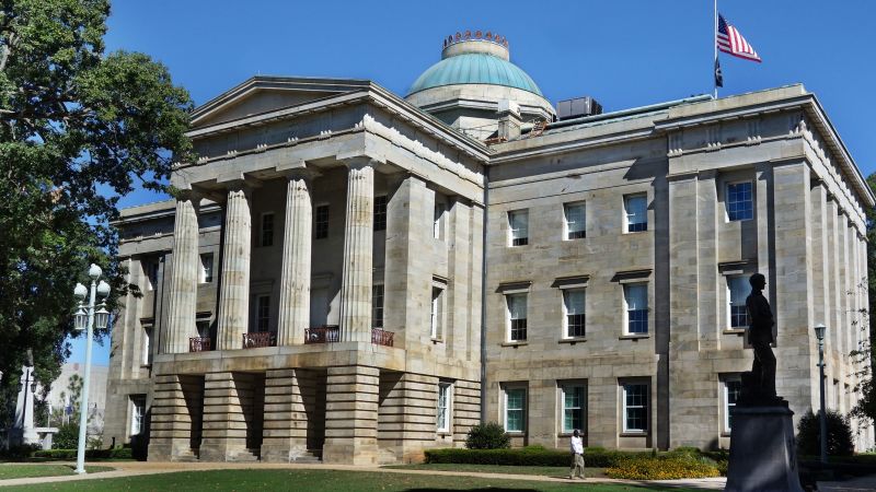 North Carolina eliminates pistol permit requirement, sparking controversy.