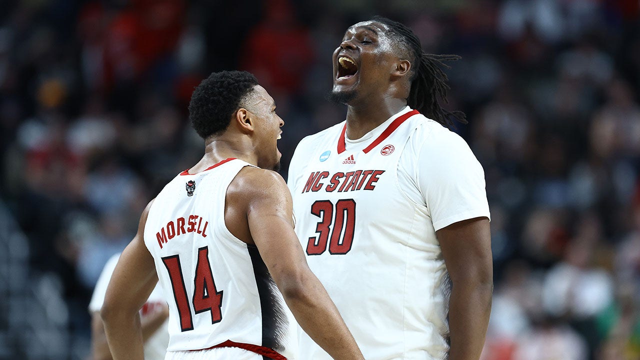 Featured image for "N.C. State's Improbable March Run: Advancing to Sweet 16 with Overtime Victory"