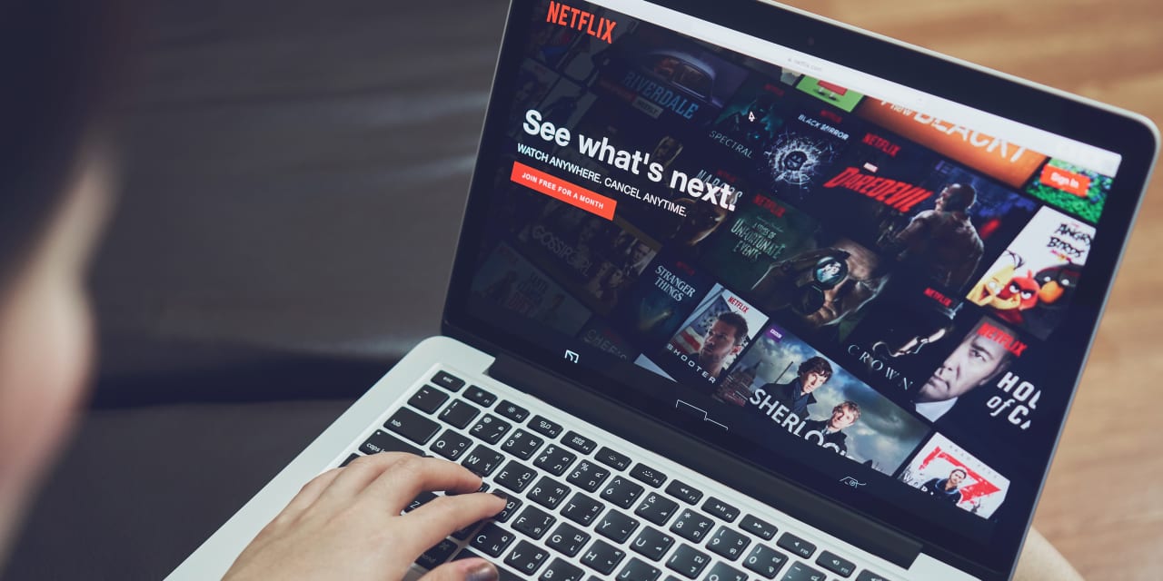 "Netflix Stock Surges as Oppenheimer Boosts Price Target and Earnings Look Promising"