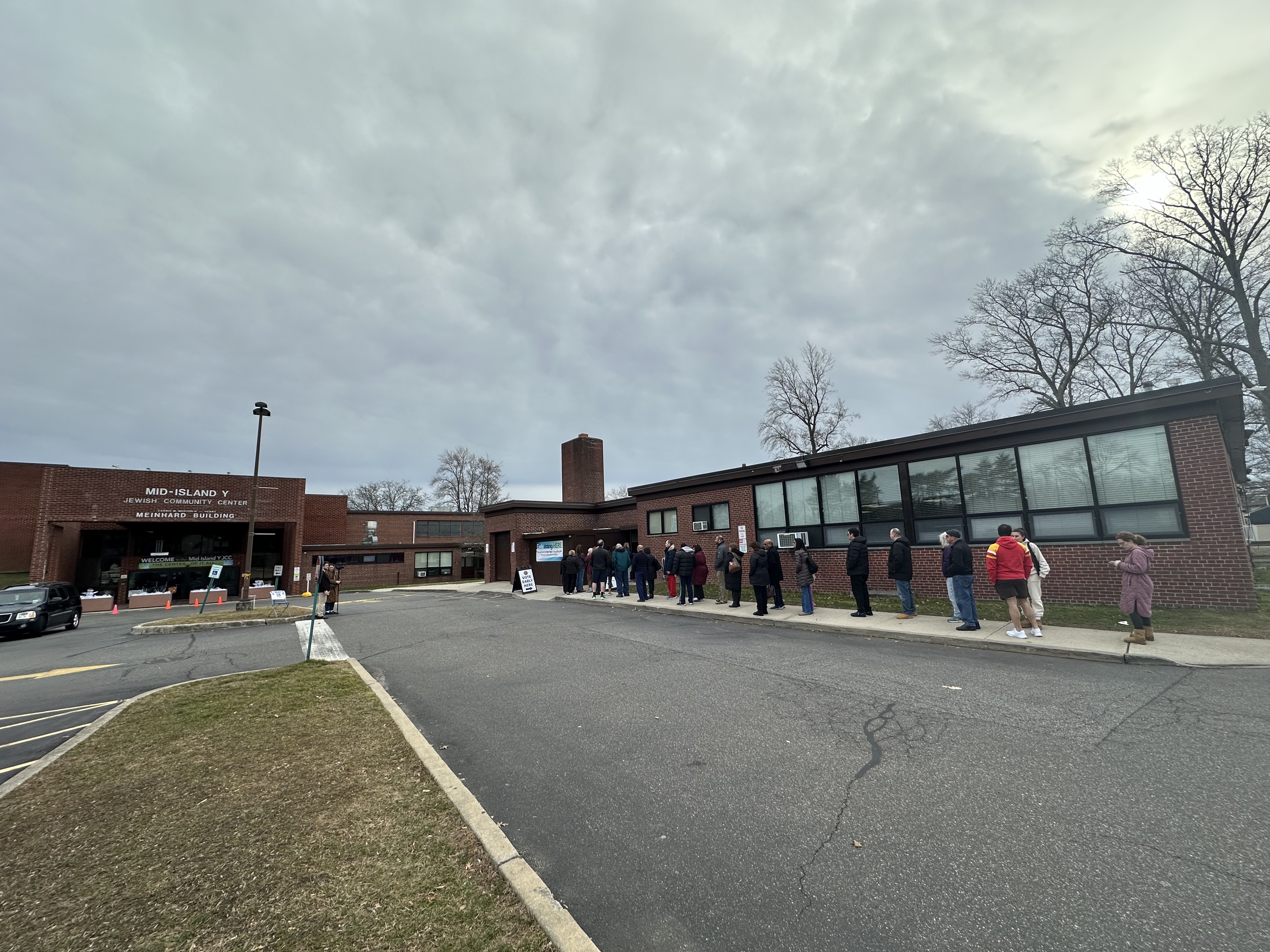 "Storm Threatens Voter Turnout as Suozzi and Pilip Battle for George Santos' Seat"