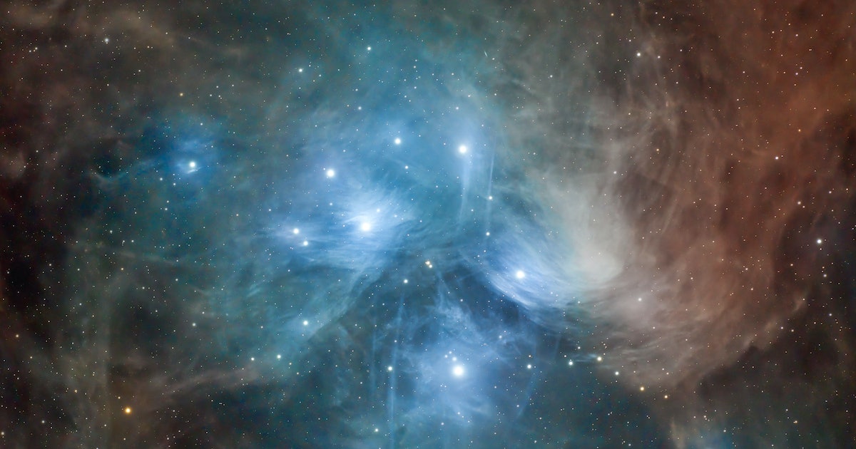 Featured image for "Star Cluster Shreds Interstellar Dust Cloud in Spectacular Display"