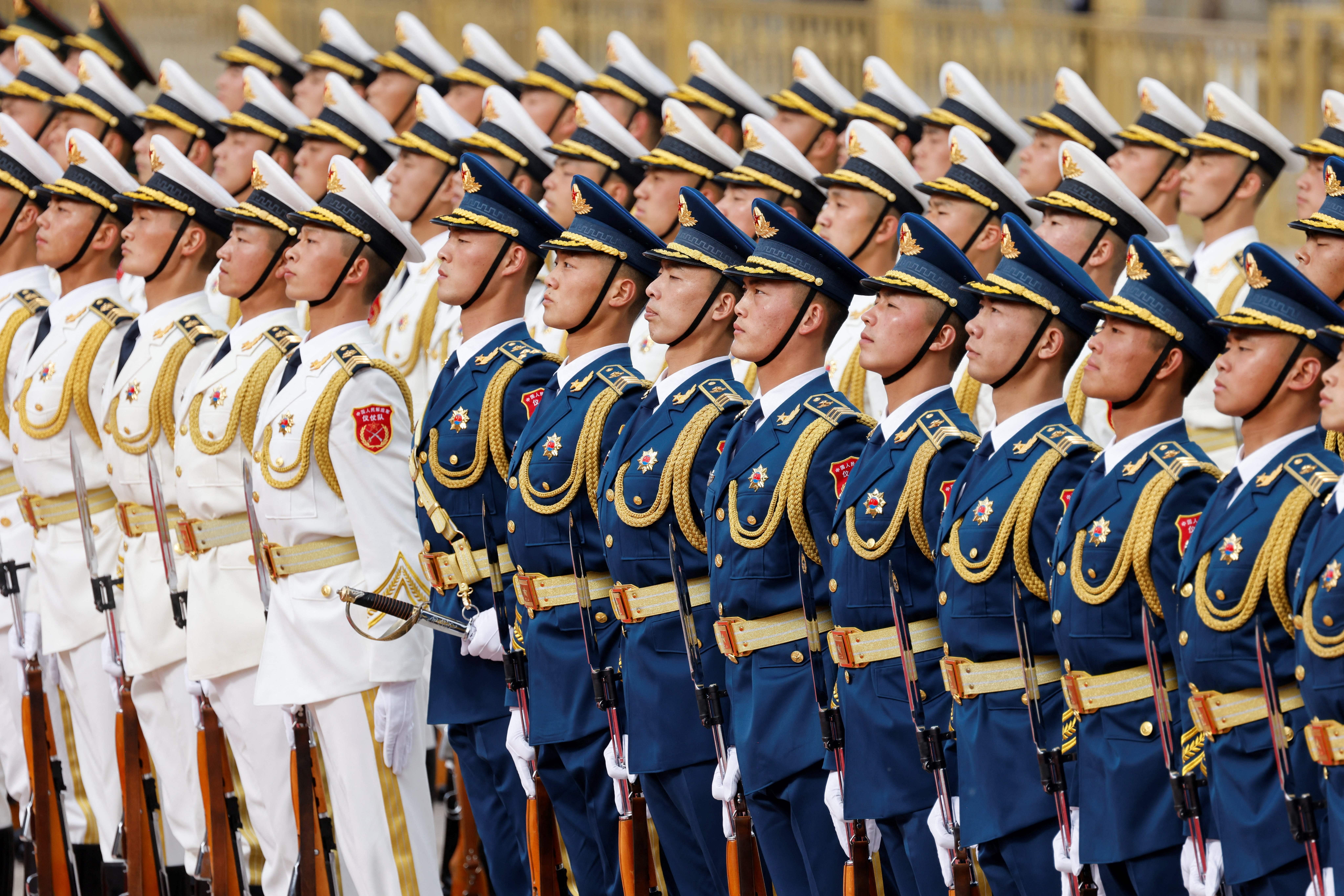 China broadens military draft to include veterans and students amid tensions with Taiwan.