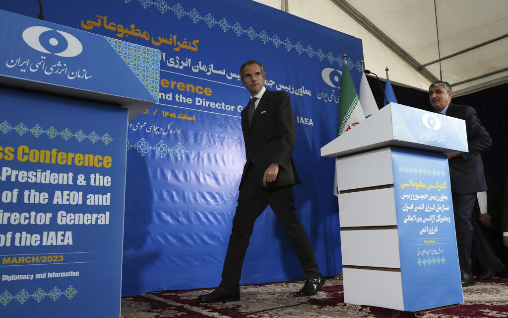 Israel accuses IAEA of bowing to Iranian pressure in closing uranium probes.