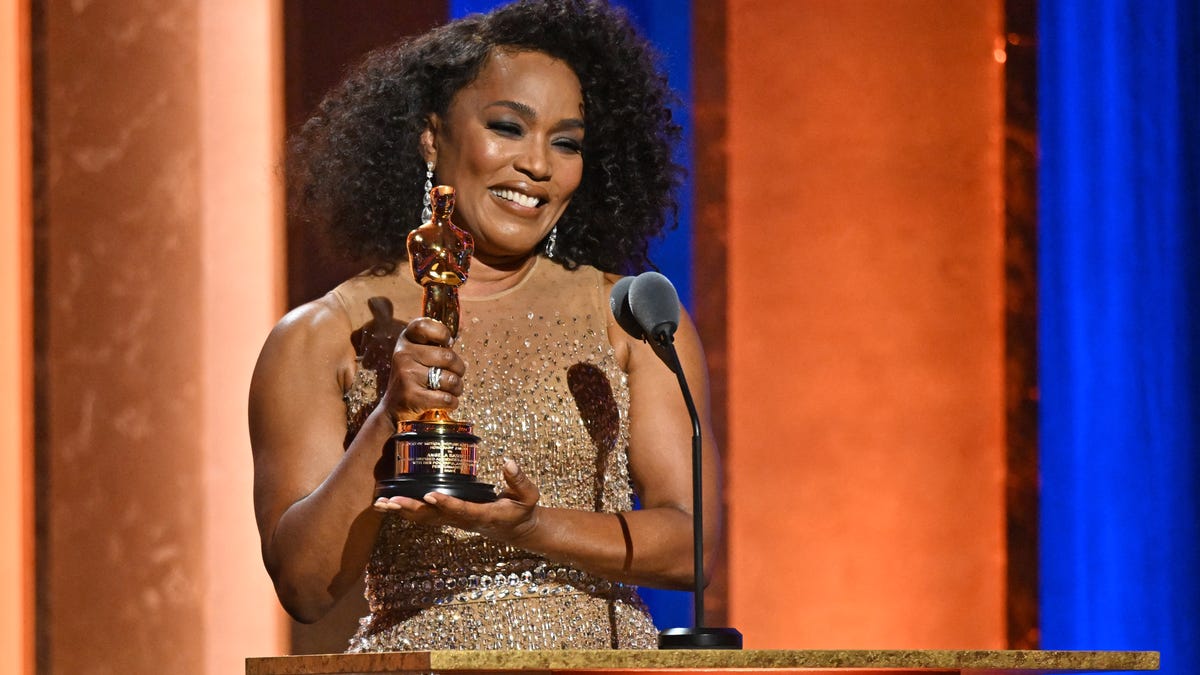 Featured image for "Angela Bassett's Historic Oscar Honor and Controversial Kiss at Governors Awards"