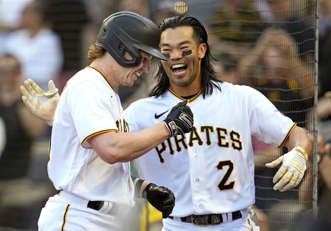 "Pirates Ride Momentum to Victory Against Reds"