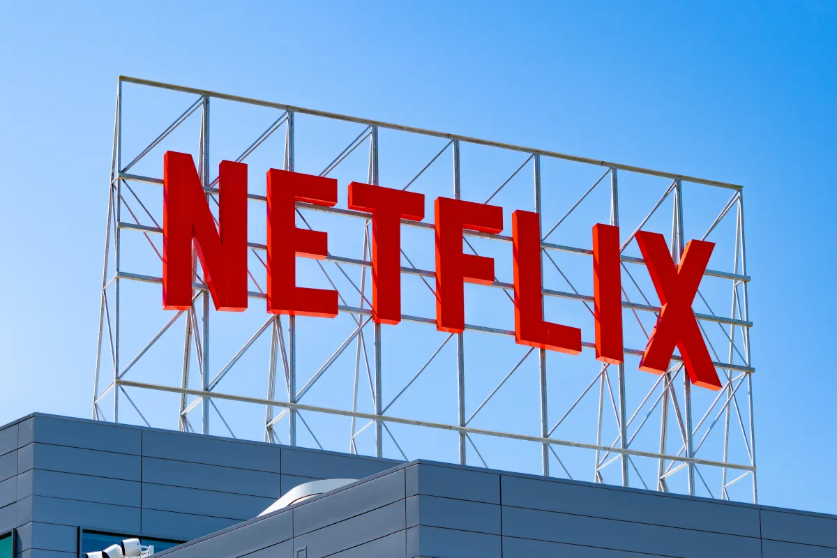 Featured image for Netflix shifts focus to quality over quantity with film restructuring and layoffs.