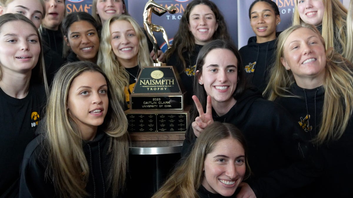 Caitlin Clark dominates college basketball, wins multiple Player of the Year awards.