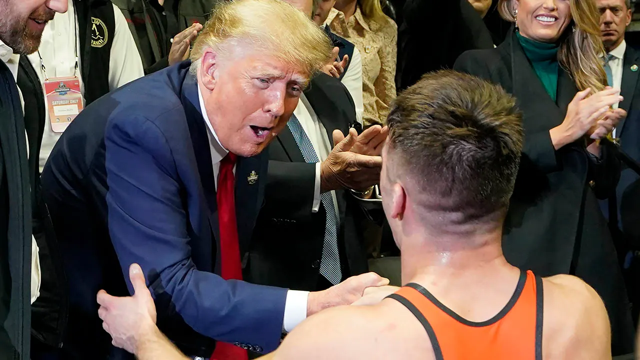 Featured image for "Trump attends NCAA wrestling championship in Oklahoma"