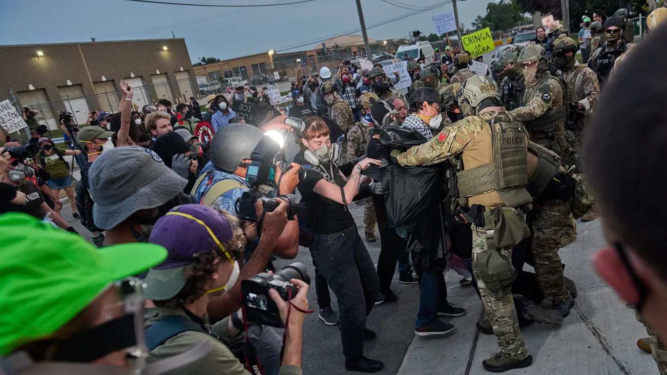 Featured image for Chicago Journalists and Protesters Sue Trump Administration Over ICE Protest Violence
