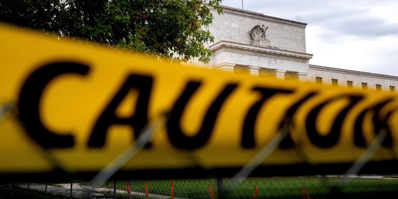 "Federal Reserve Signals Rates Staying High Despite Treasury Yield Rise"