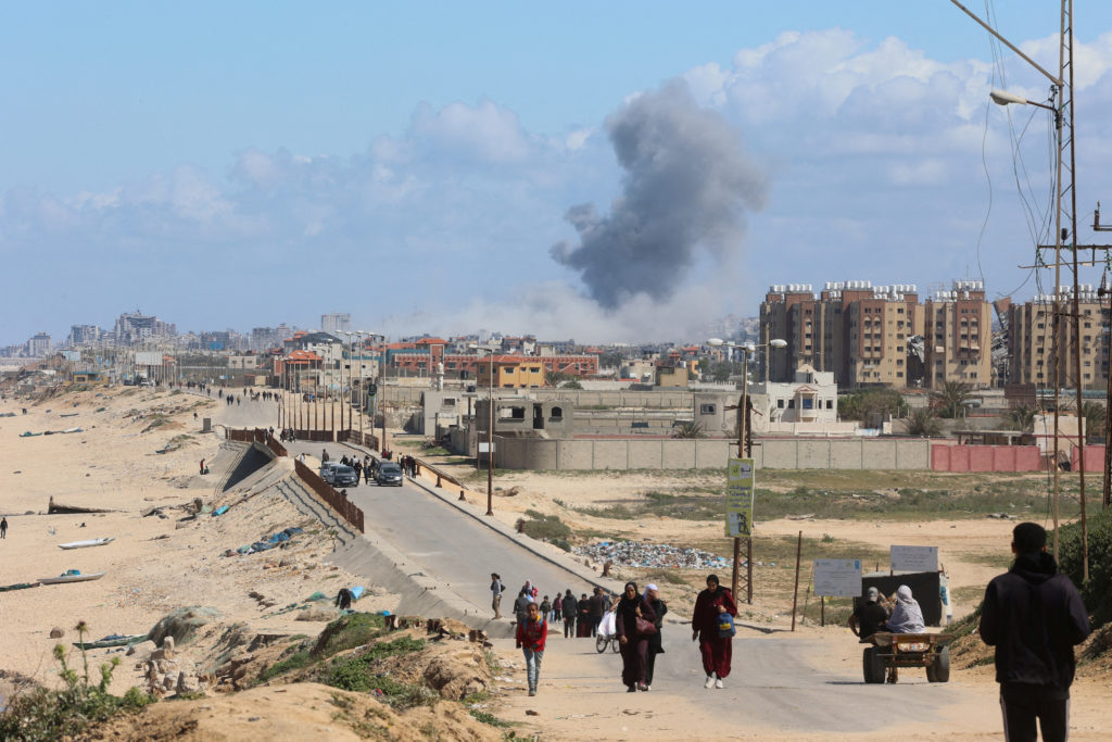 "Israel-Hamas Conflict: Deadly Airstrikes and Aid Controversy in Gaza"