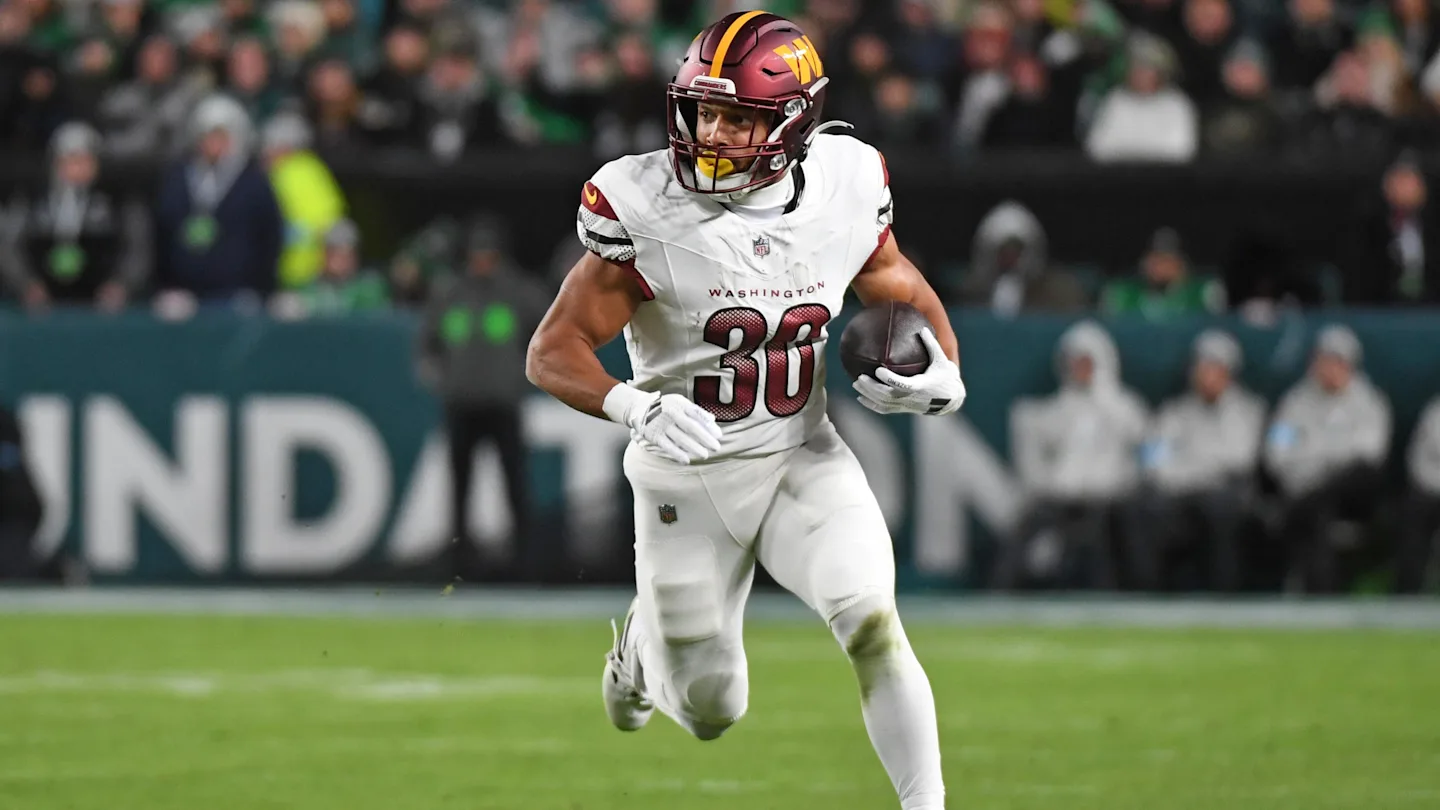 Featured image for Commanders' Austin Ekeler Hospitalized with Concussion After Cowboys Game