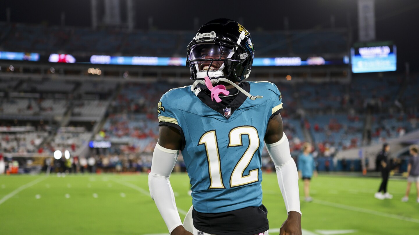 Featured image for Travis Hunter sidelined for season after knee surgery