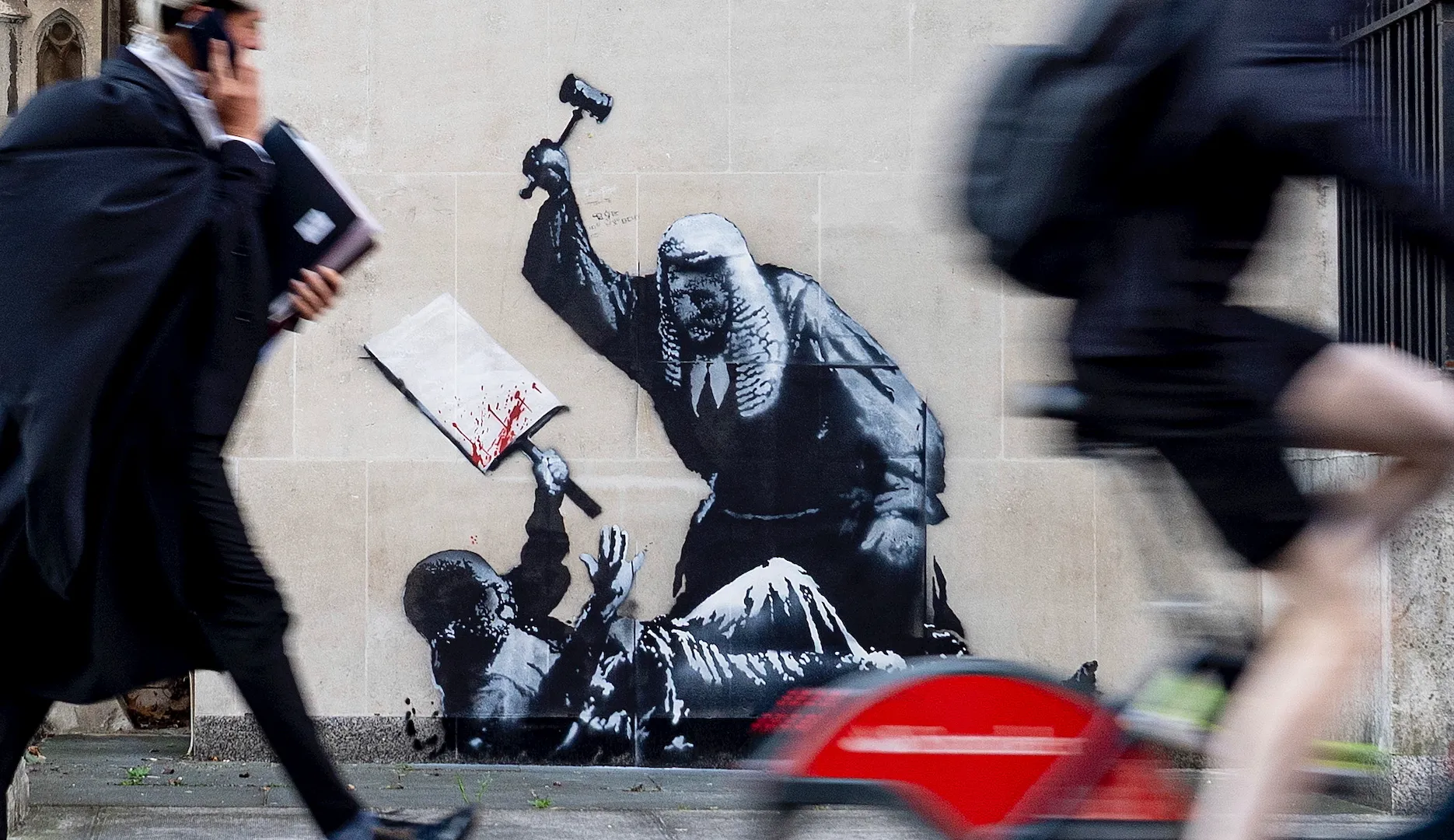 Featured image for Banksy Mural Depicts Judge Attacking Protester at Royal Courts