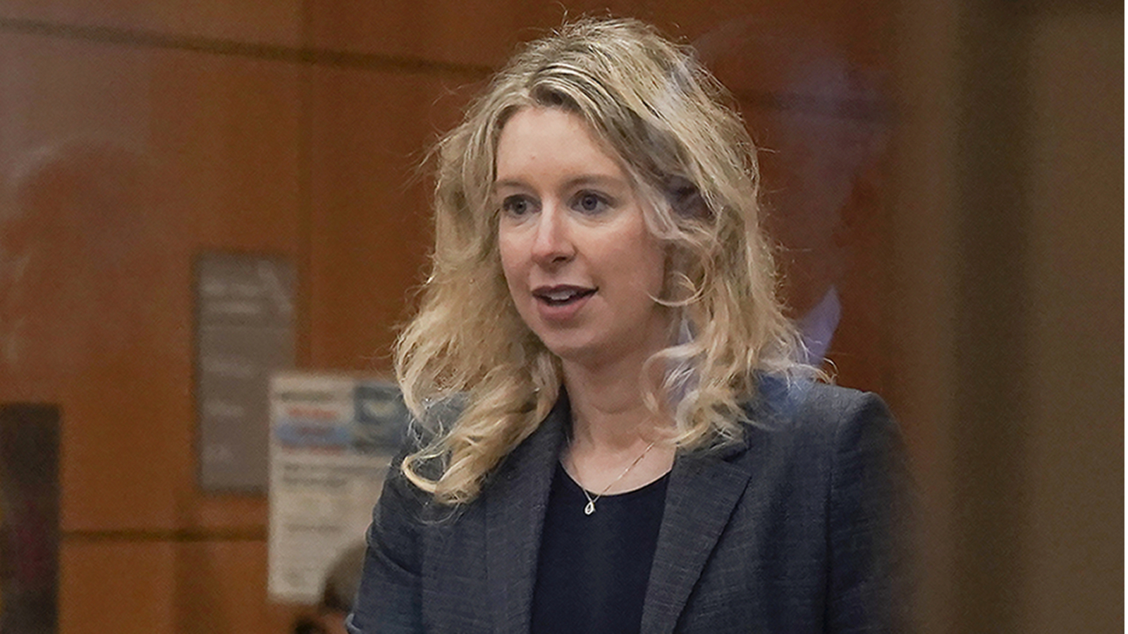 Elizabeth Holmes denied request to avoid prison and faces $452 million restitution bill.