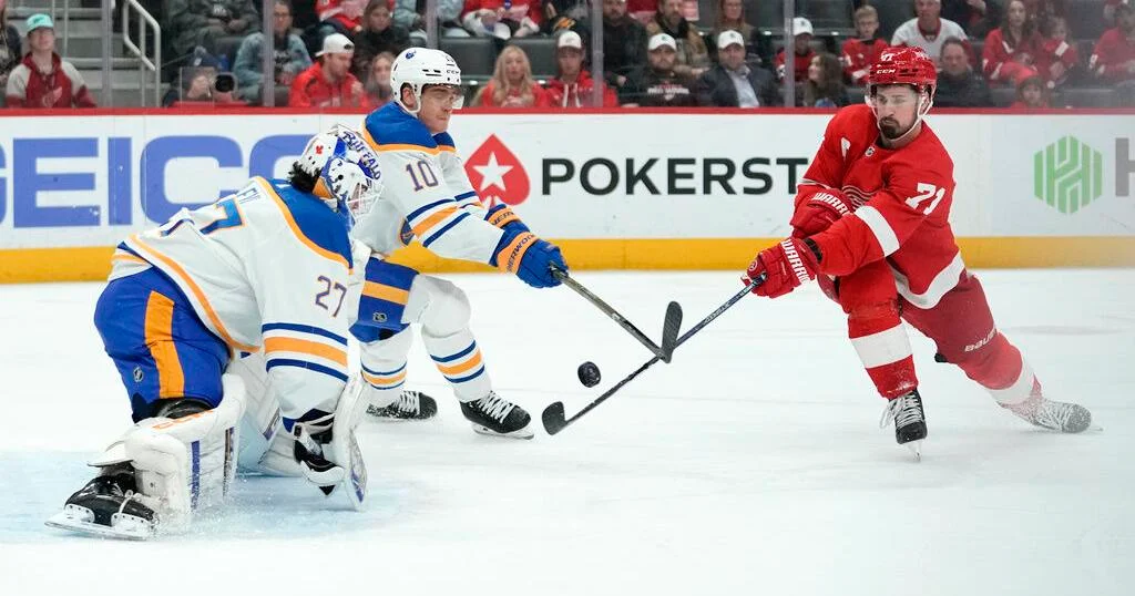 Sabres secure shootout victory over Red Wings in high-scoring game.