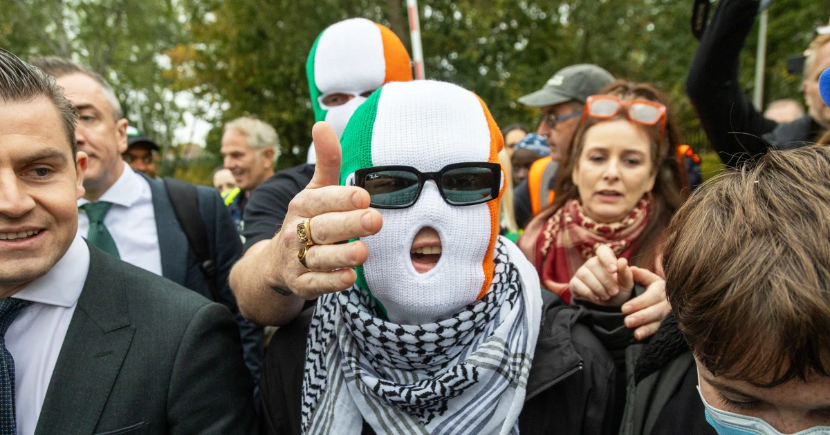 Featured image for U.K. Court Dismisses Terror Charges Against Kneecap Member