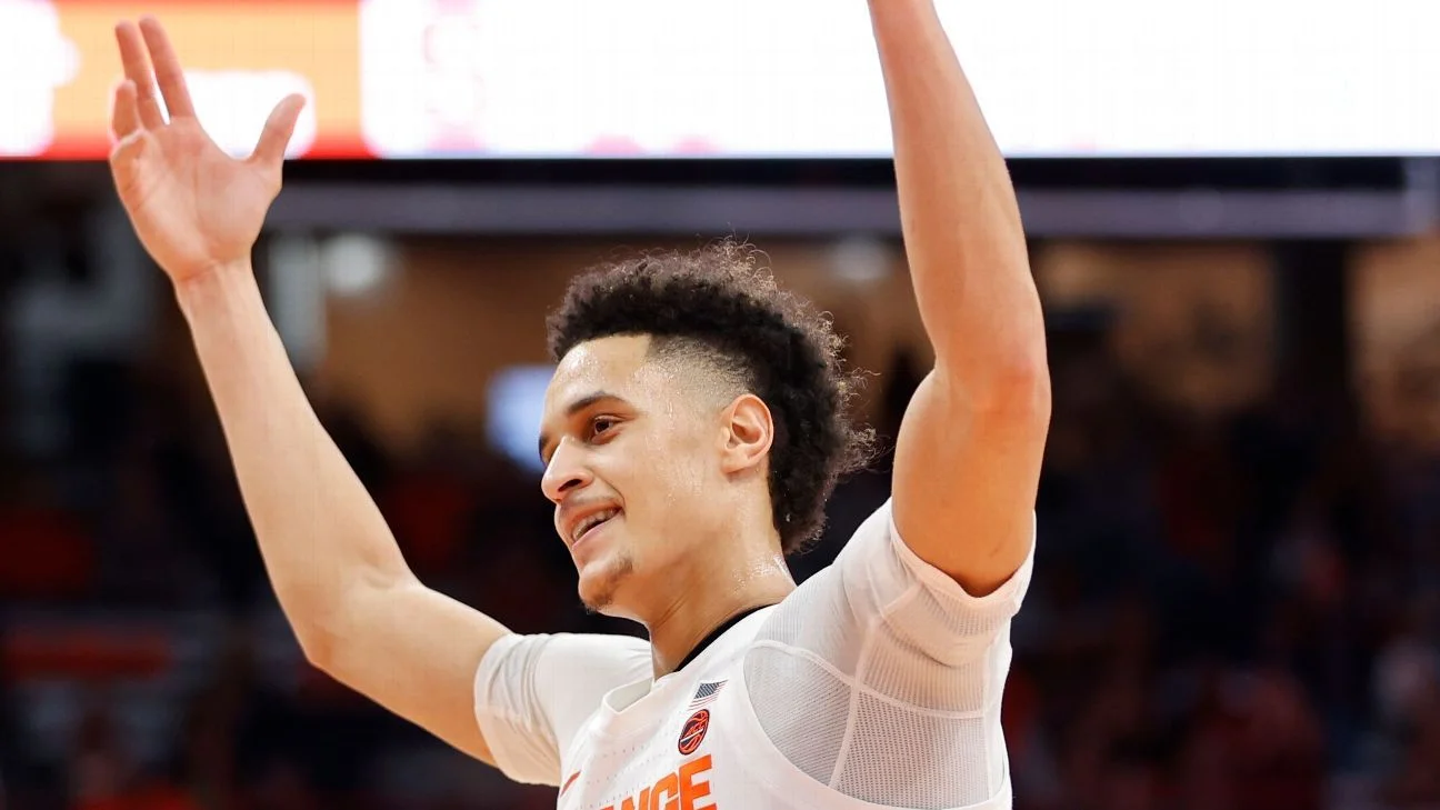 West Virginia adds Syracuse transfer Jesse Edwards to basketball roster.