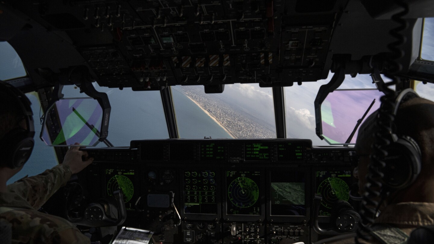 Featured image for "AP Reporters Witness US Military Airdrop Aid to Devastated Gaza"