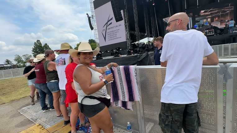 Featured image for Country Artist Surprises Anderson Township Woman at VOA Country Music Fest