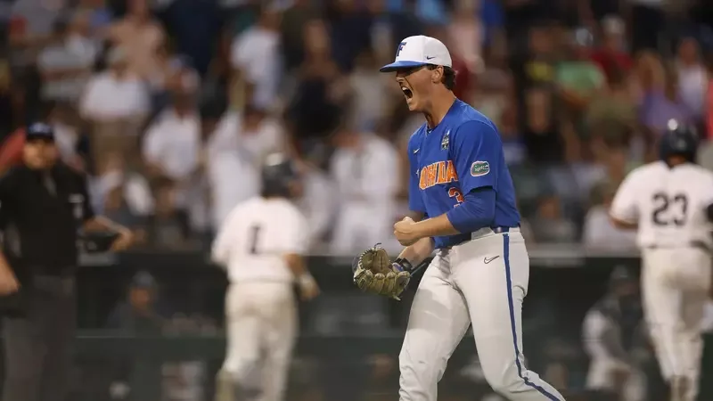 Florida Gators narrowly defeat Oral Roberts to remain unbeaten in College World Series.