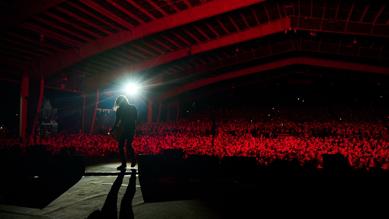 Featured image for "Foo Fighters' 'But Here We Are': A Heavy and Raw Act of Mourning"