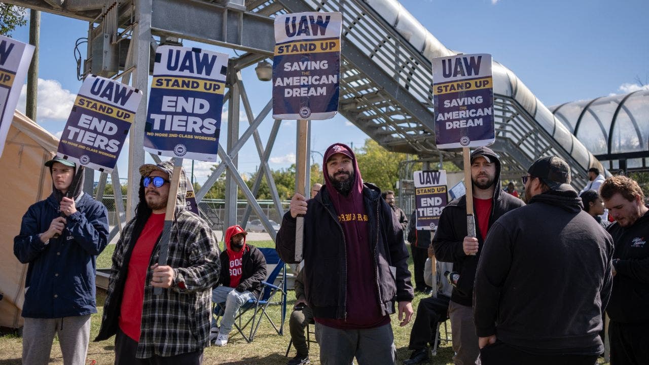 "UAW Strikes: Impact on US Economy and Automakers"