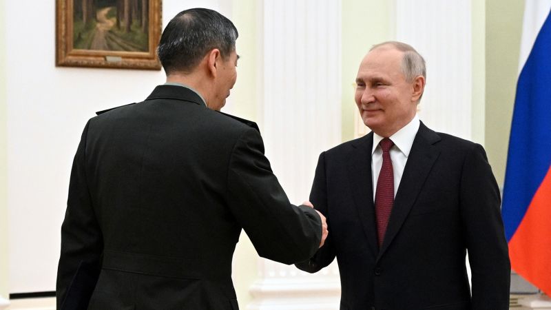 China's Defense Minister Meets Putin in Moscow, Strengthening Military Ties.