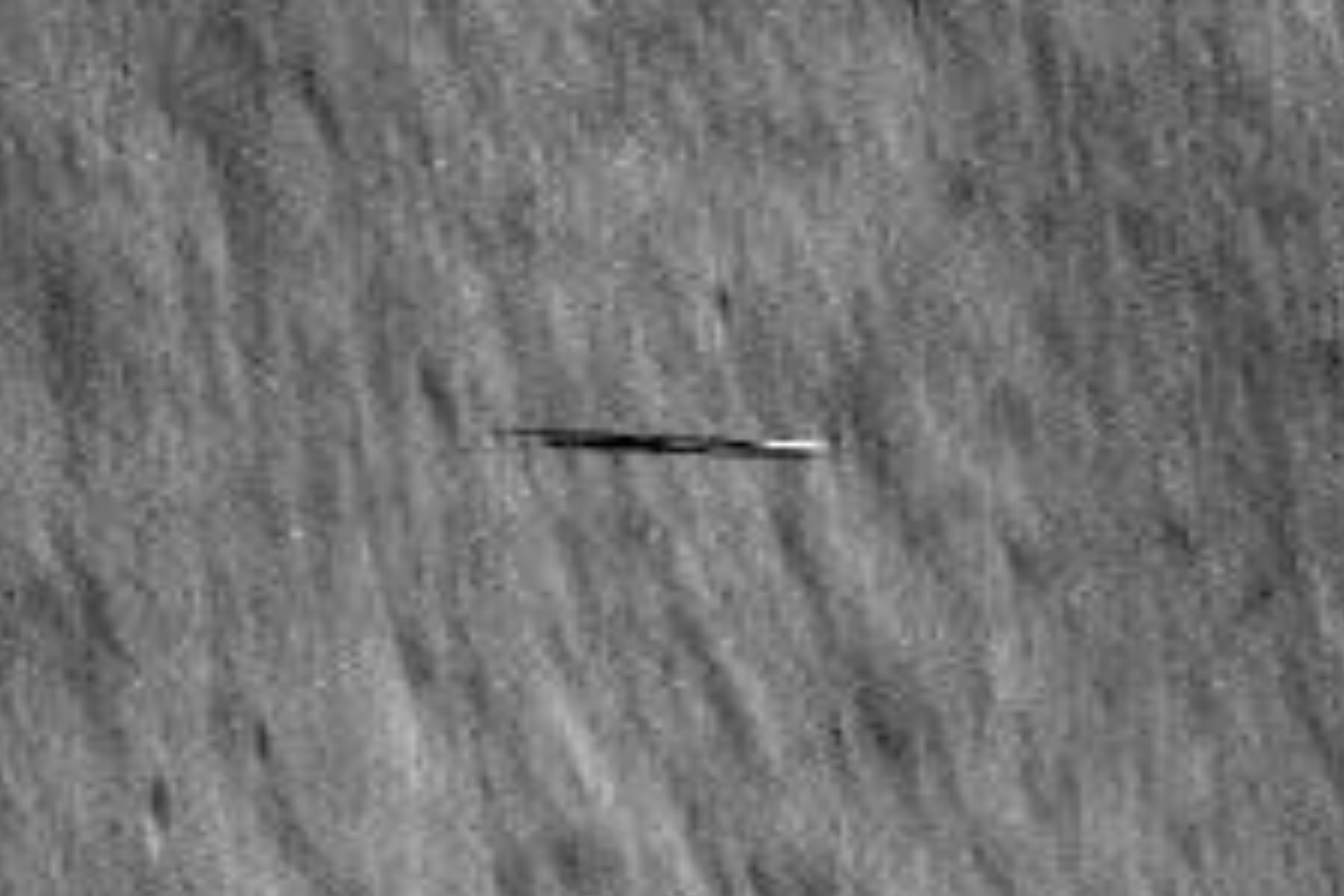 Featured image for "Mysterious Surfboard-Shaped Object Spotted Speeding Around Moon by NASA's LRO"