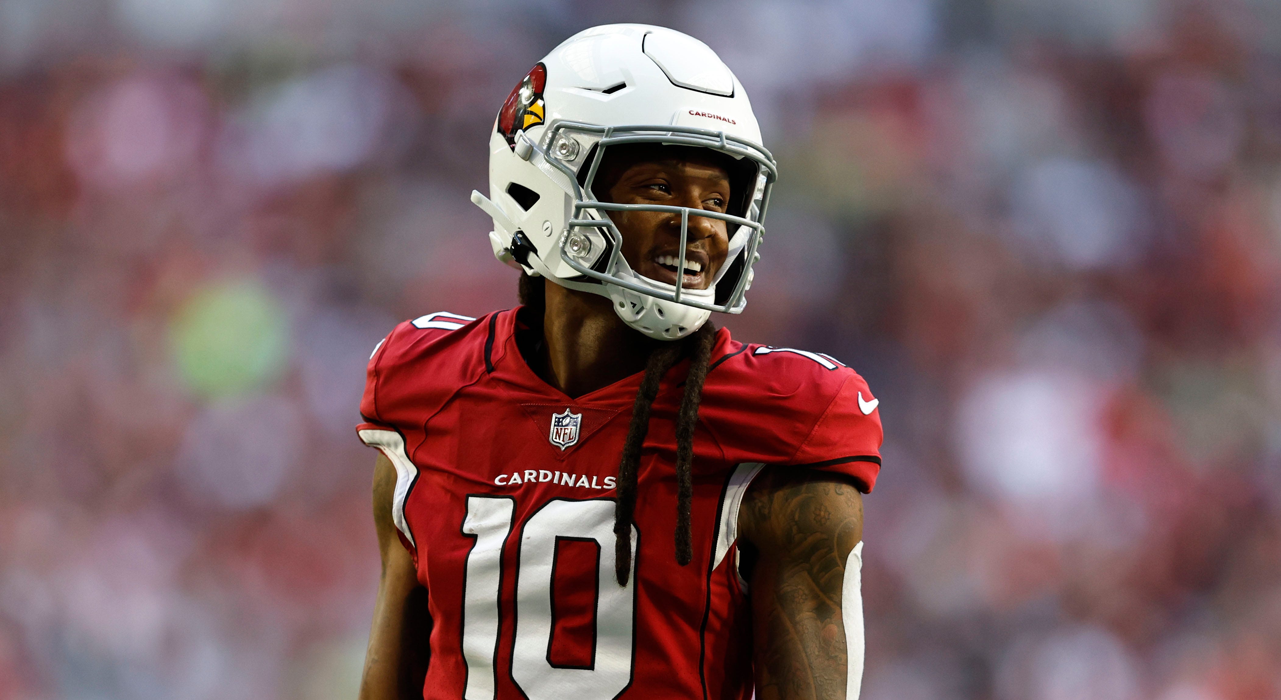 DeAndre Hopkins hints at preferred trade destinations, refutes contract rumors.