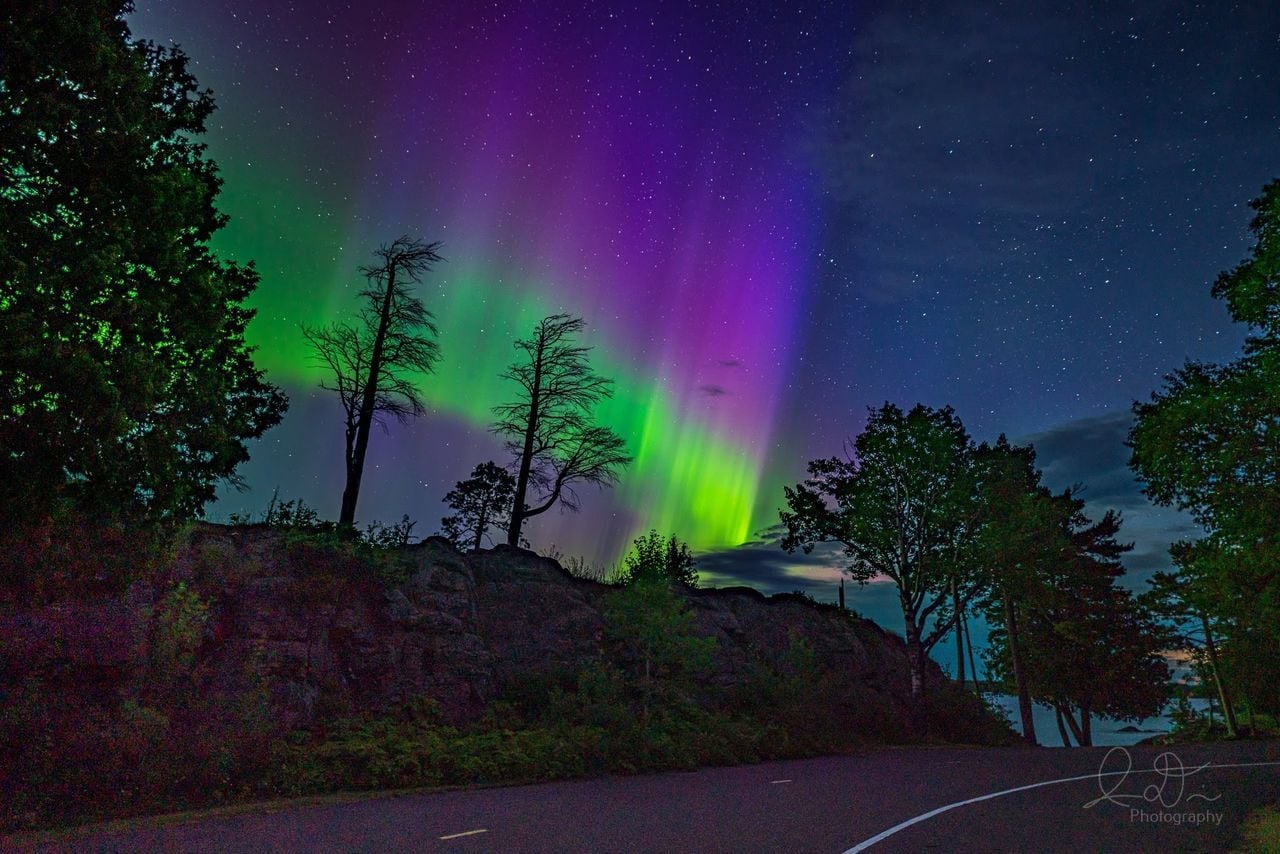 Featured image for "2024's Top Northern Lights Destinations: From the U.P. to Toronto Skies"