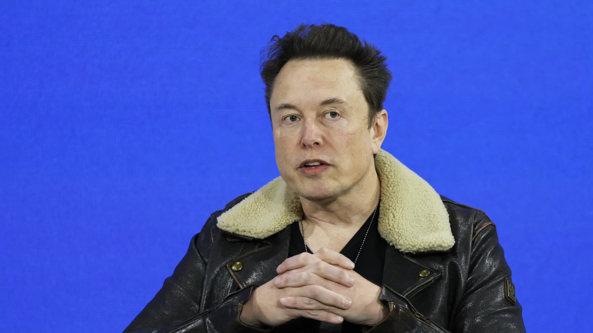 Elon Musk Lifts Ban on Alex Jones' X Account, Sparks Controversy