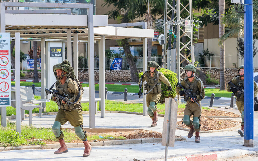 "Israel's Evacuation of Gaza-area Towns: Clearing the Path for Gunmen Hunt"