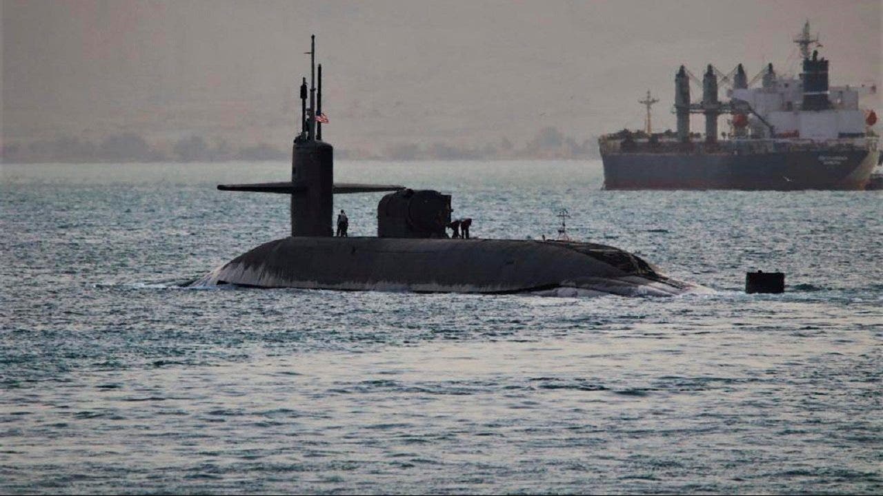 US deploys guided-missile sub to Middle East as show of force against Iran.