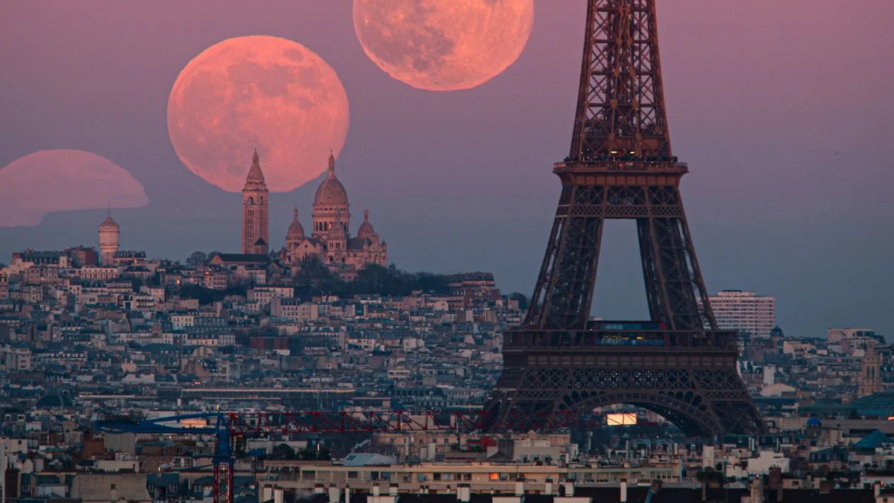Wolf Moon Dwarfs the Paris Skyline in Stunning Night-Sky Composite