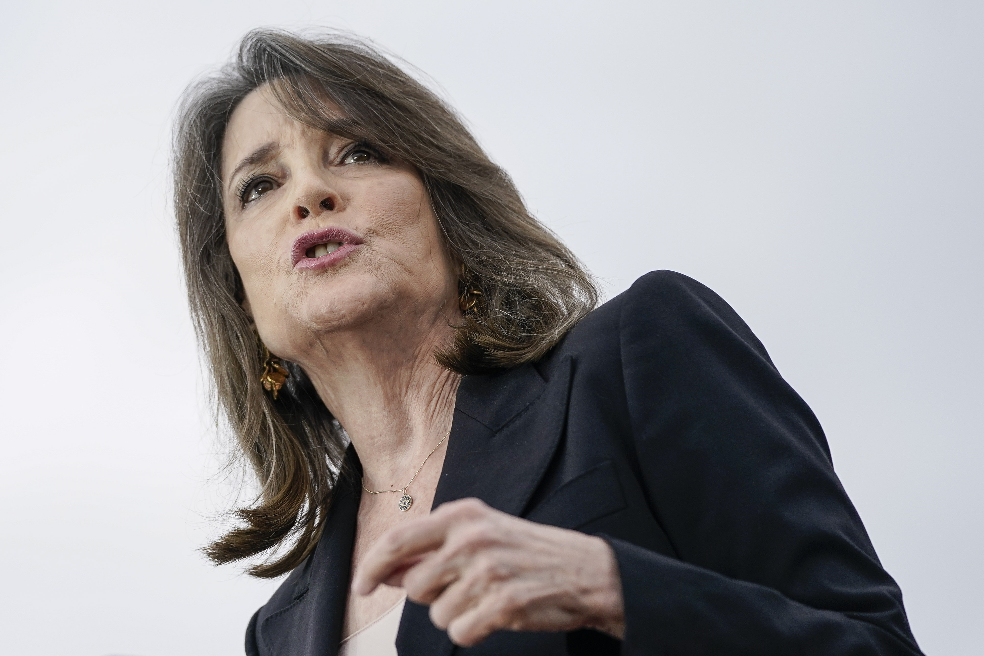 Marianne Williamson's Presidential Campaign Faces Setbacks and Challenges