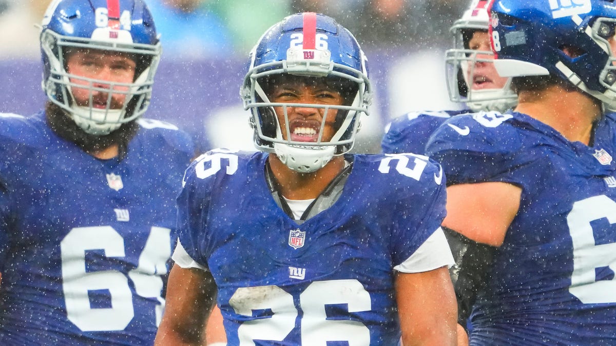Featured image for "Saquon Barkley and Tiki Barber's Feud Escalates Over Giants Departure"