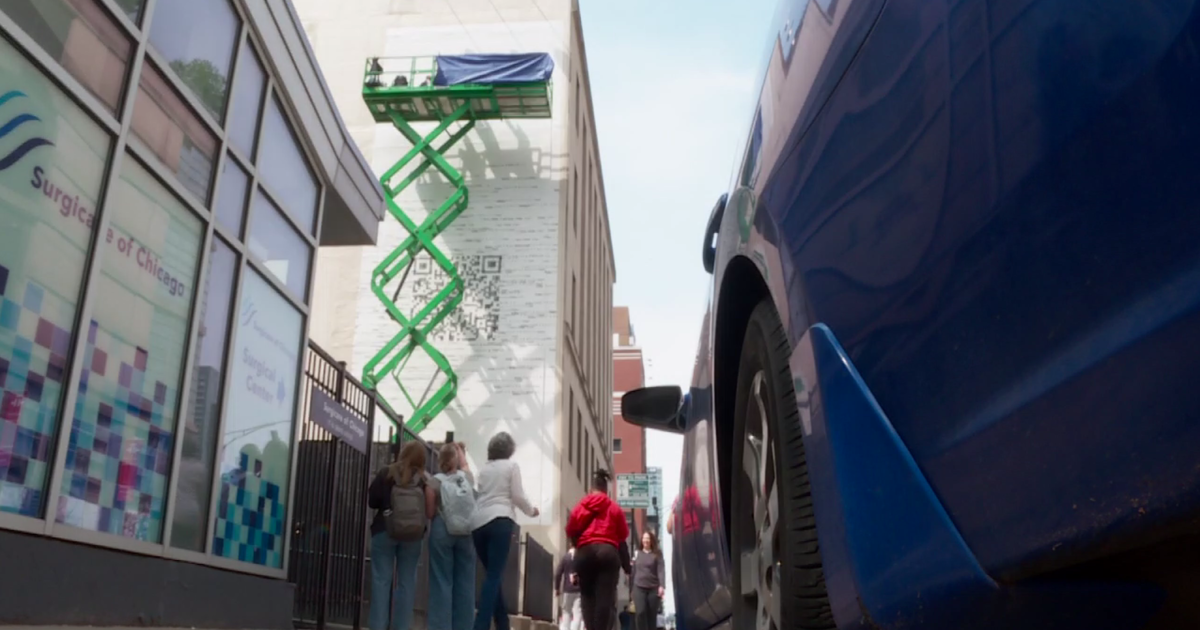 Featured image for "Taylor Swift's Enigmatic Chicago QR Code Mural Sparks Excitement and Speculation"