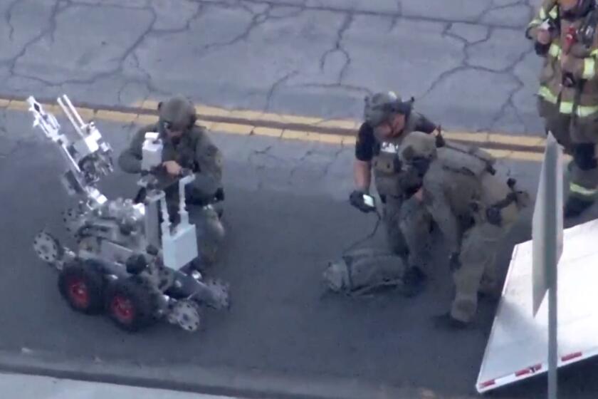 Featured image for Police Fatally Shoot Man Claiming Explosives in Fullerton Bank Robbery Attempt