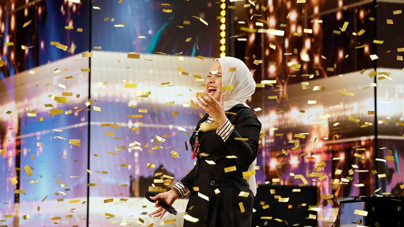 Blind singer Putri Ariani wows Simon Cowell on AGT with golden buzzer performance.