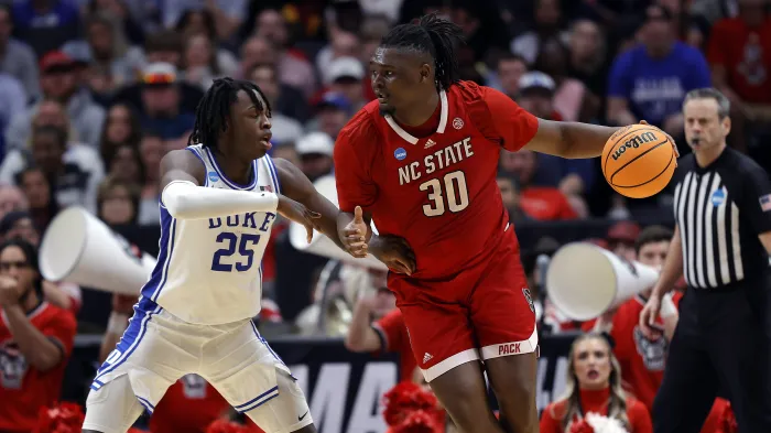Featured image for "DJ Burns Jr. Leads NC State to Men's Final Four with Team-Building Success"