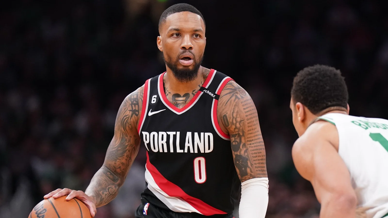 "Damian Lillard's Trade Talk Sparks Humorous Response from Jayson Tatum"