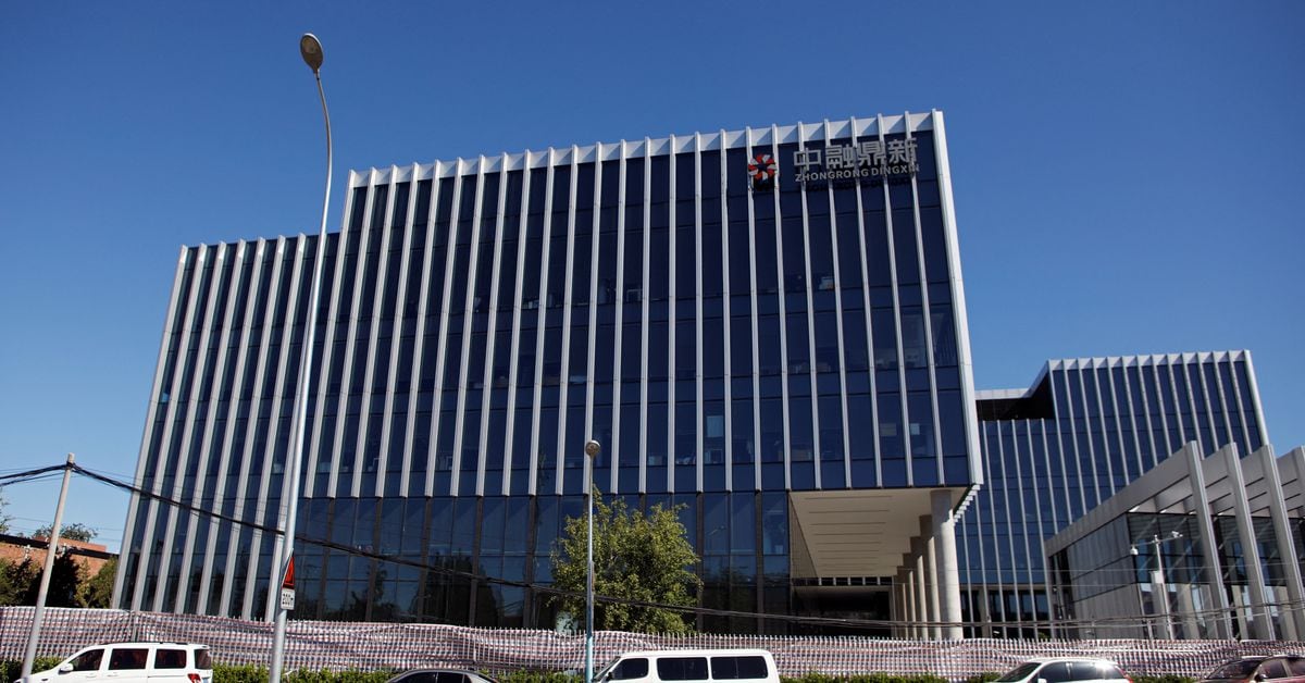 Beijing police investigate China's troubled shadow banking giant Zhongzhi