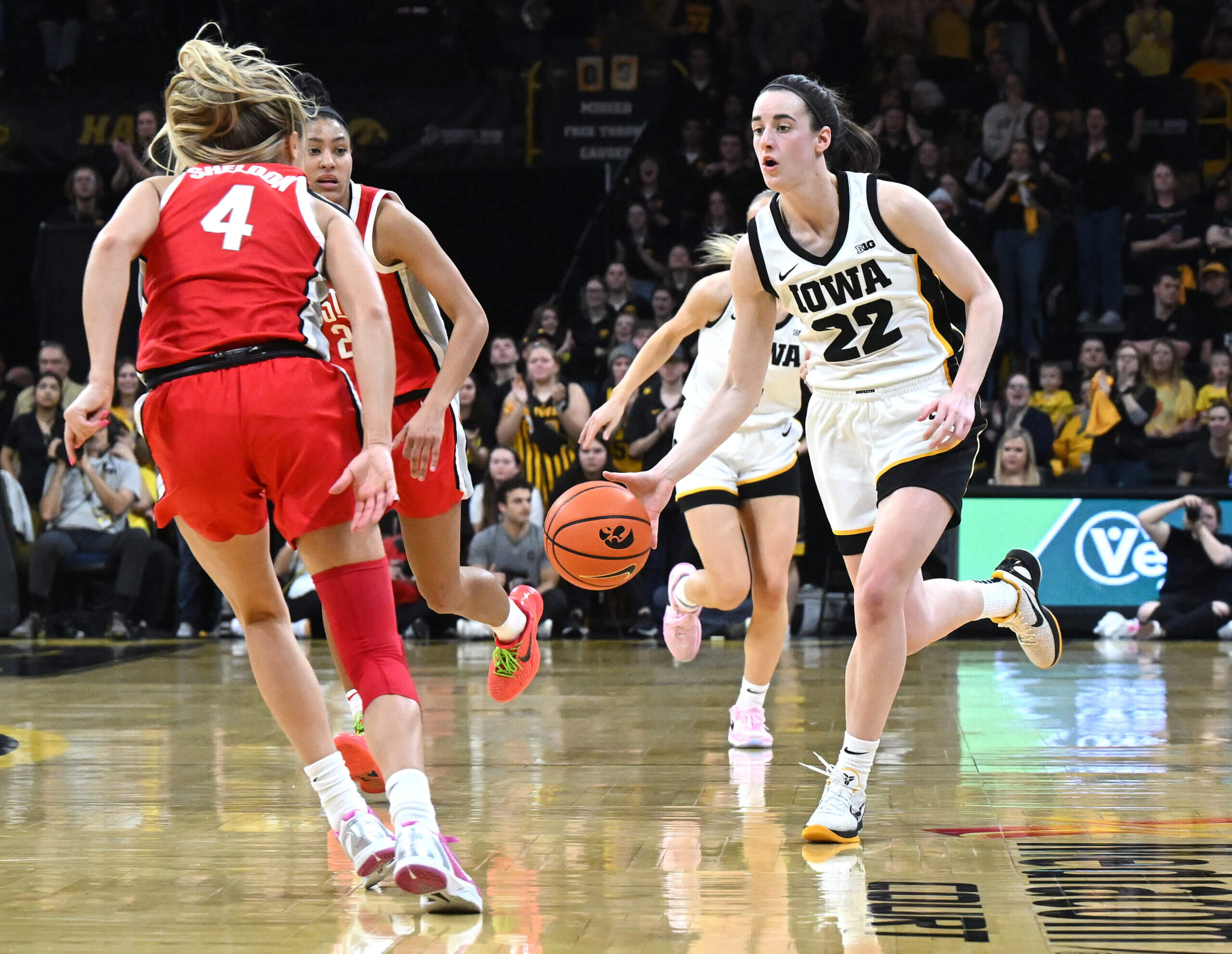 "Caitlin Clark Breaks NCAA Scoring Record, Dominates Women's Basketball Viewership"