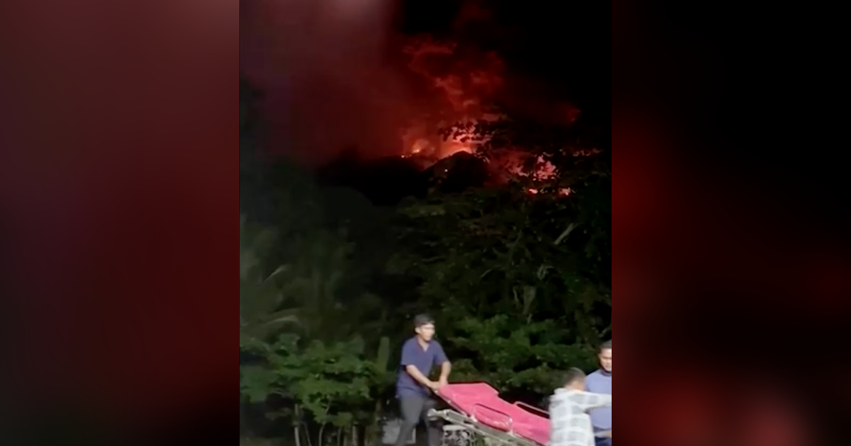 "Indonesia's Mount Ruang Eruption Forces Hundreds to Evacuate Amid Red Ash Sky"