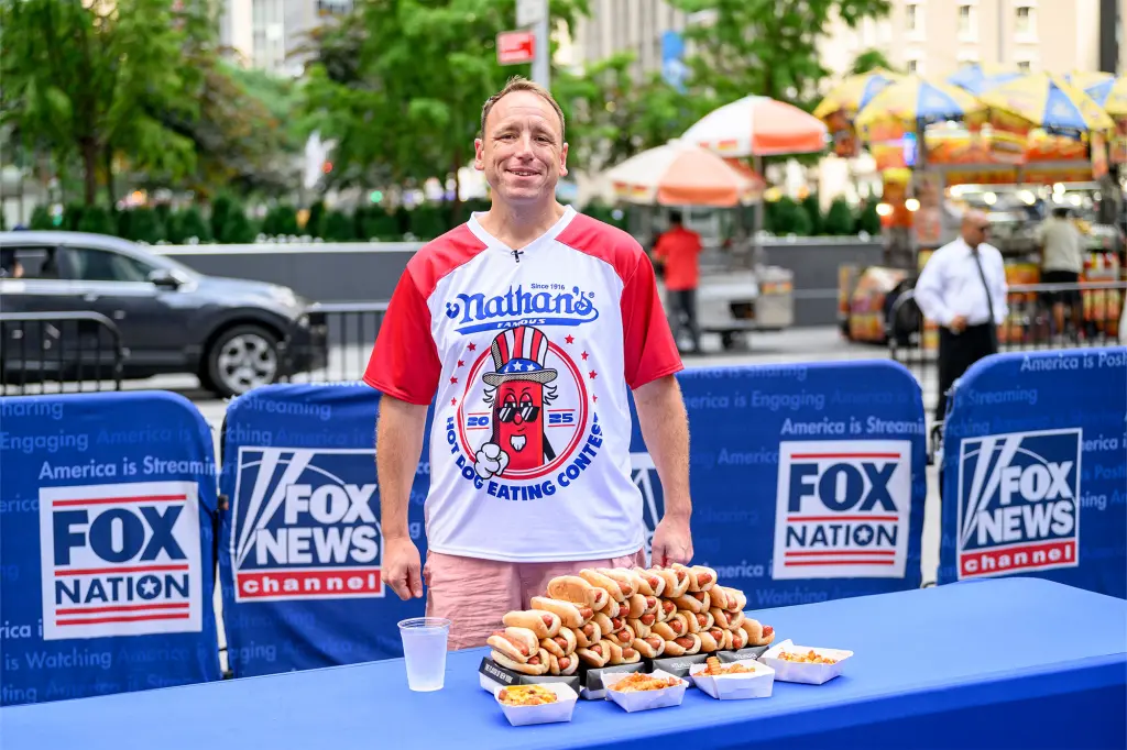 Featured image for Joey Chestnut Returns to Nathan's Hot Dog Contest Amid PETA Presence