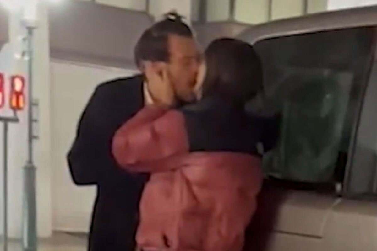 Featured image for Harry Styles and Emily Ratajkowski caught kissing in Tokyo, sparking dating rumors.