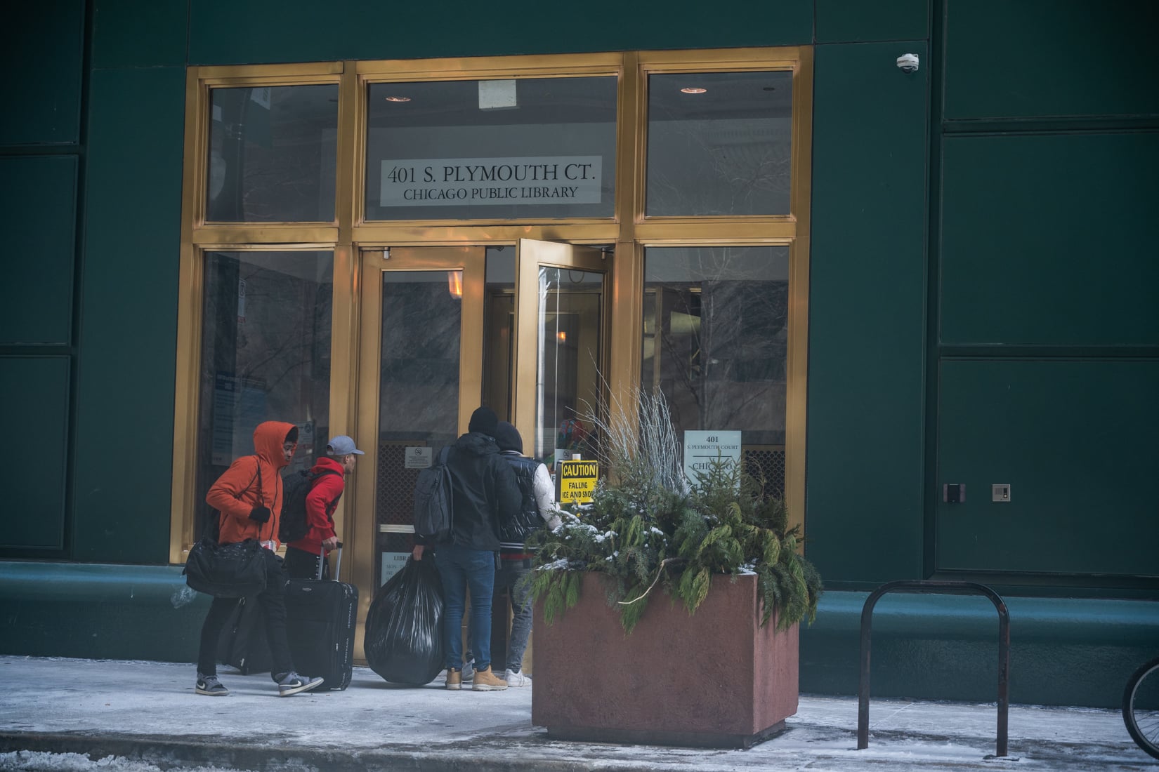 Featured image for "Migrants relocated to Harold Washington Library during subzero temperatures"