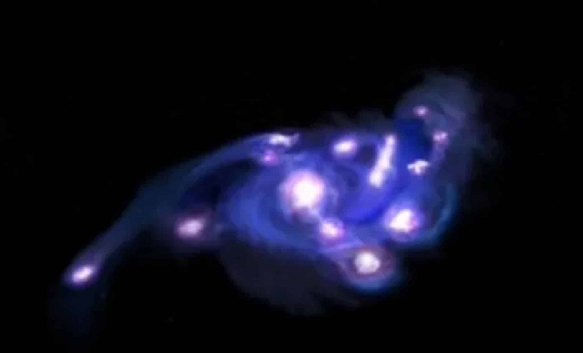 Featured image for Astronomers Discover 'Cosmic Grapes' Galaxy from the Early Universe